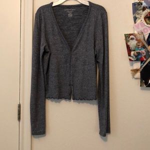 Button up sweater with a cute ruffle bottom